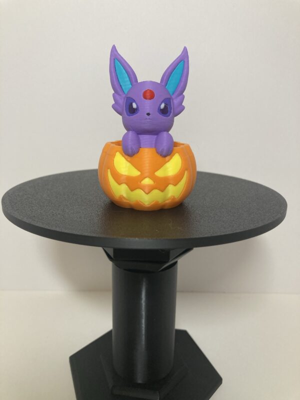 Espeon in a Pumpkin Figure