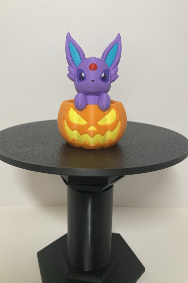 Espeon in a Pumpkin Figure