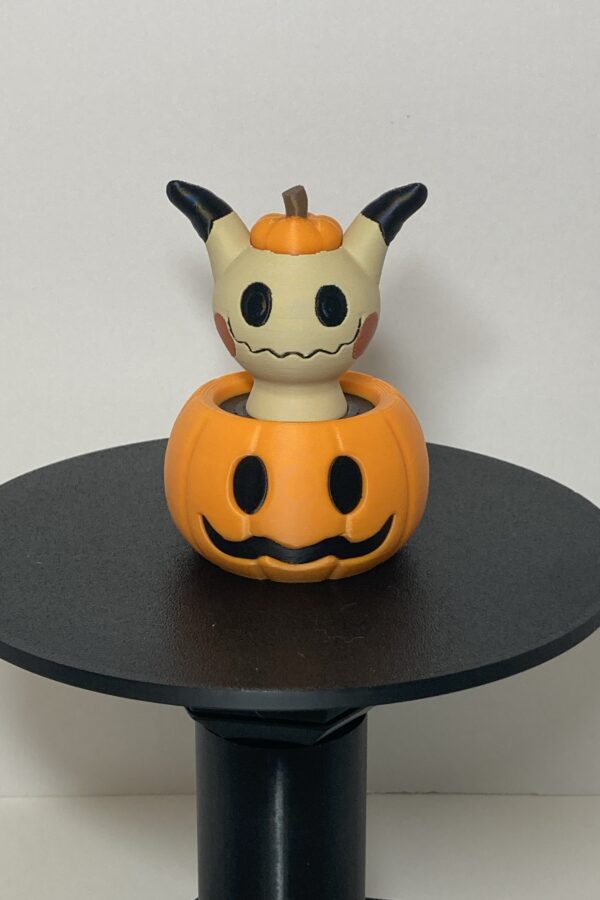 Mimikyu in a Pumpkin Figure